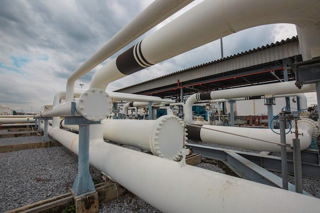 Steel long pipes and pipe elbow in station oil factory during refinery Petrochemistry industry