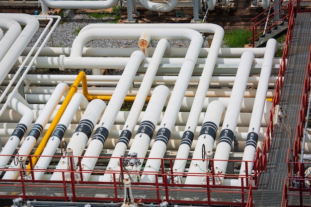 Steel long pipes and pipe elbow in station oil factory during refinery Petrochemistry industry