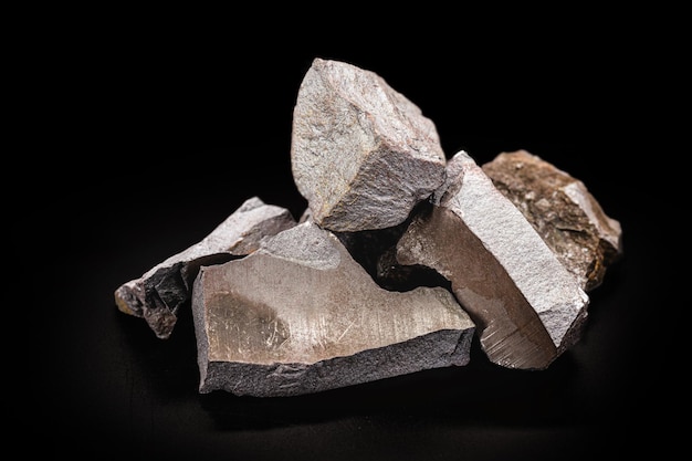 Steel ore produced from iron ore isolated black background