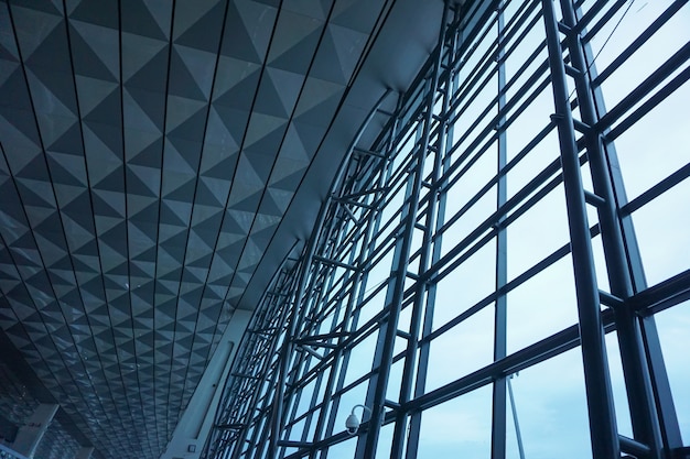 The steel structure of the glass wall in airport.