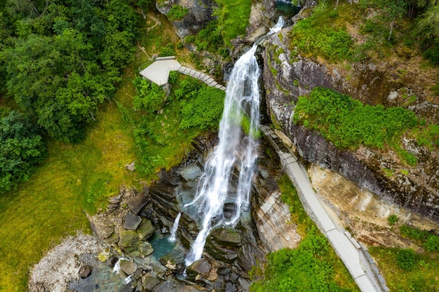 Steinsdalsfossen is a waterfall in the village of Steine in the municipality of Kvam in Hordaland county Norway The waterfall is one of the most visited tourist sites in Norway