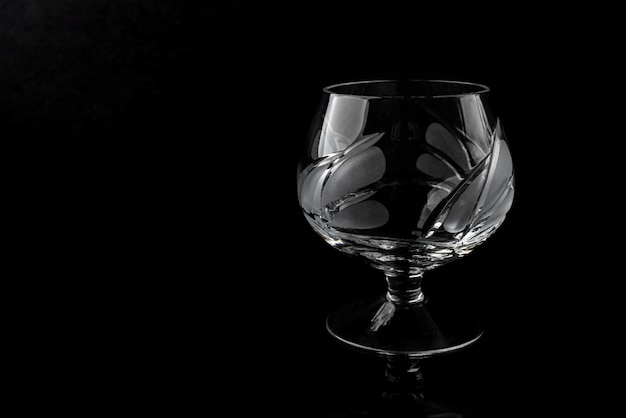 Stemware on black background.