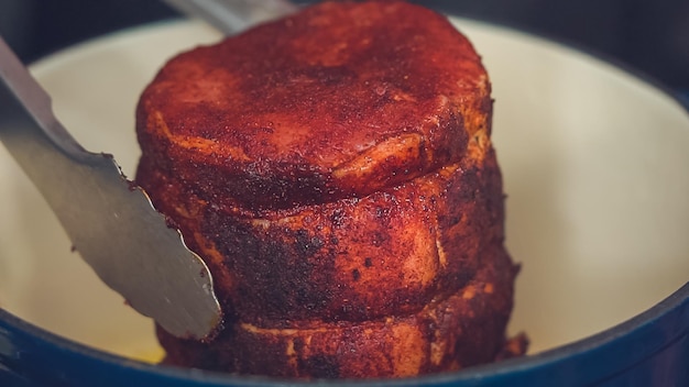 Step by step. Cooking boneless pork roast in cast iron dutch oven.