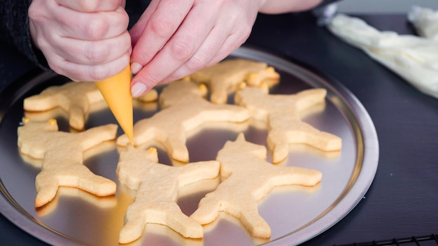 Step by step. Decorating unicorn sugar cookies with royal icing.