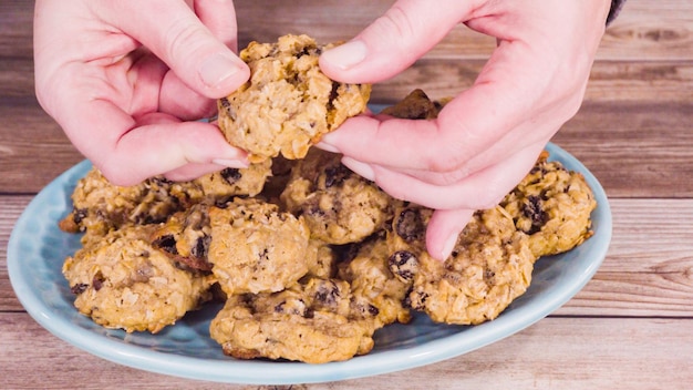 Step by step. Freshly baked chewy oatmeal raising cookies.