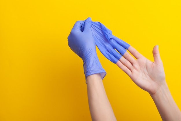 Step-by-step instructions on how to remove dirty gloves, doctor take off from hand glove