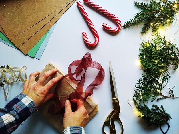 Photo step-by-step instructions for packing a christmas gift diy gift wrapping