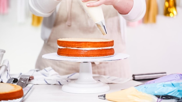 Photo step by step. pastry chef making unicorn cake for little girl birthday party.