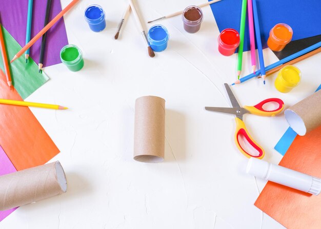 Step1 DIY paper rabbit from a roll of toilet paper Easy craft for kids on white background simple