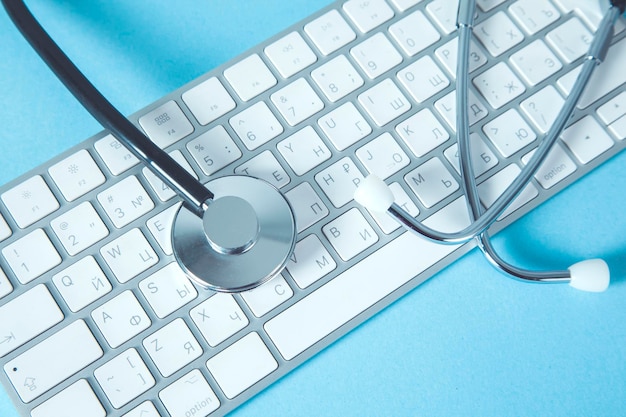 Stethoscope on computer keyboard