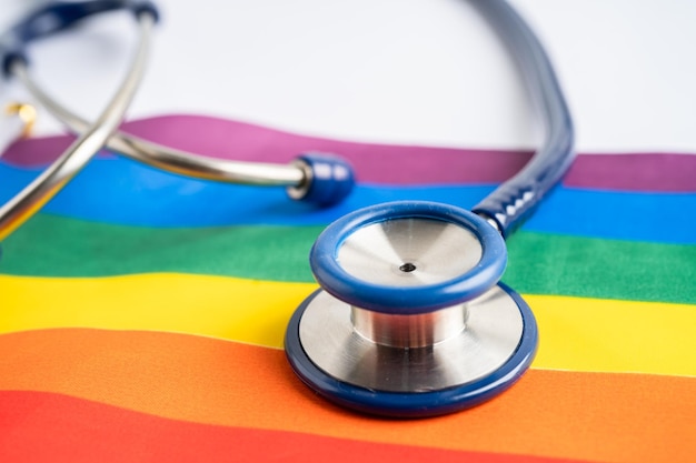 Stethoscope on rainbow flag background symbol of LGBT pride month celebrate annual in June social symbol of gay lesbian bisexual transgender human rights and peace