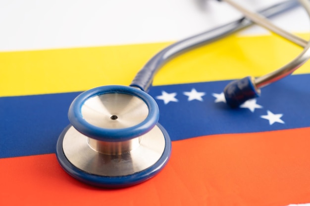 Stethoscope on Venezuela flag background Business and finance concept