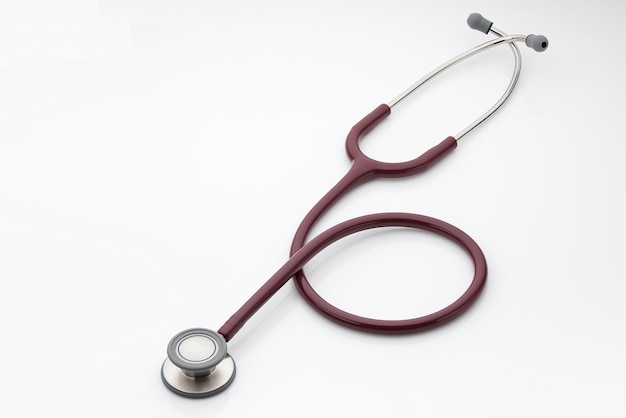 Stethoscope on a white background top view