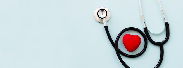 Stethoscope with red heart and copy space