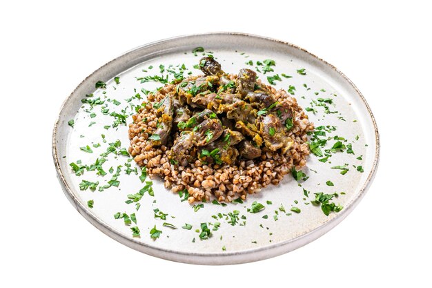 Photo stewed chicken stomachs with vegetables and buckwheat on a plate isolated on white background top view