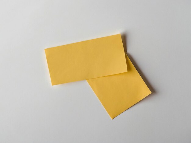 Sticky note in yellow color on white backdrop