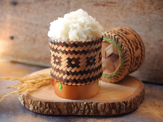 Sticky rice in traditional bamboo basket. Thai and lao main food.