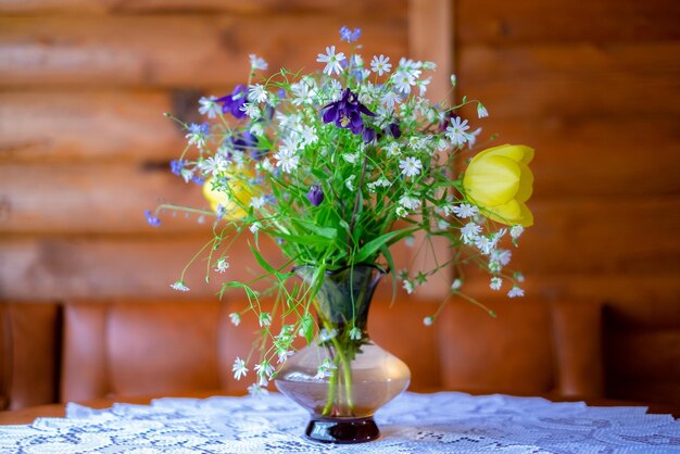 Still Life a delicate bouquet of wildflowers in a vase