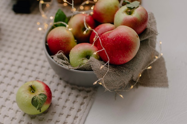 still life with apples in basket on table