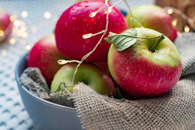 still life with apples in basket on table