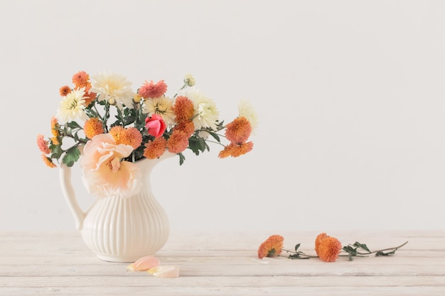 Still life with  chrysanthemum on white wall