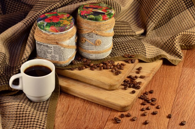 Still life with coffee cup and beans