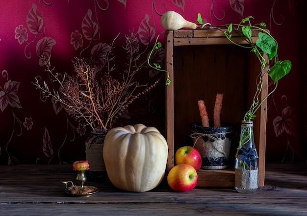 Still Life with pumpkin on wooden background