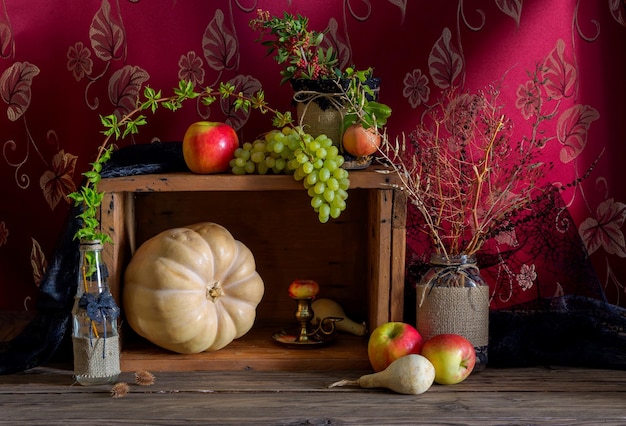 Still Life with pumpkin on wooden background