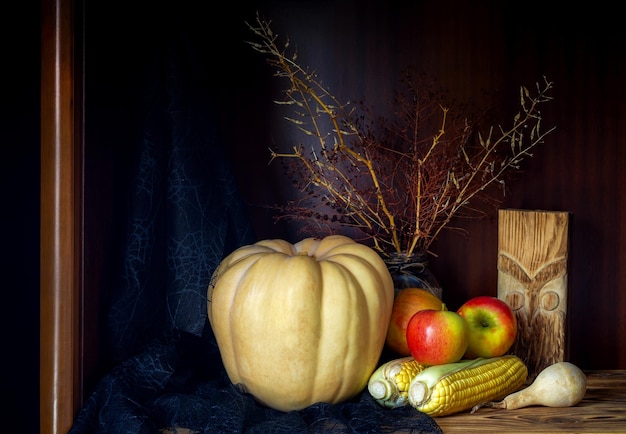 Still Life with pumpkin on wooden background