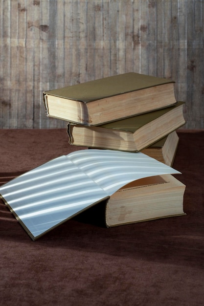 Still life with a stack of old books on the table