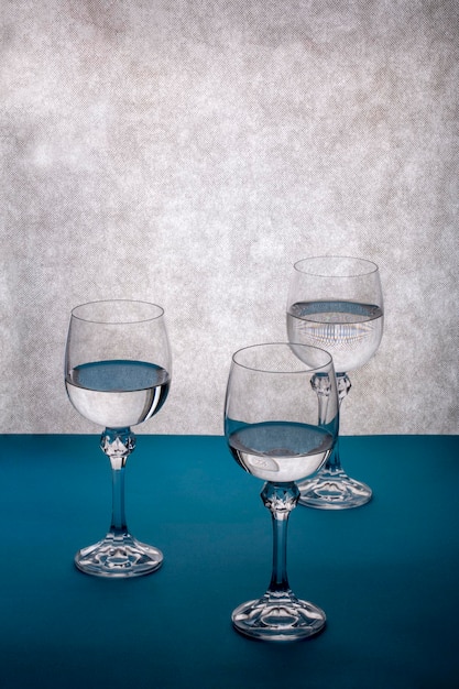 Still life with three glasses of liquid