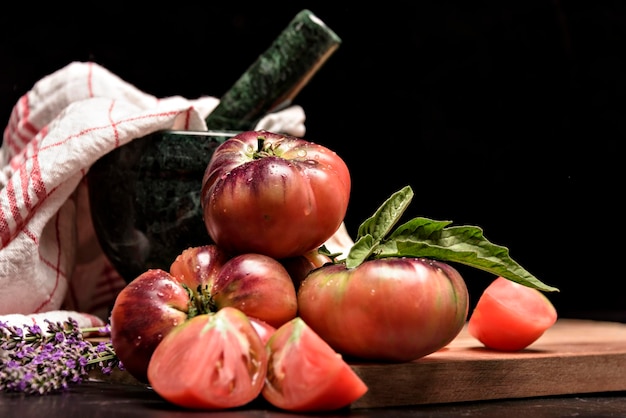 Still life with tiger tomato on wood table