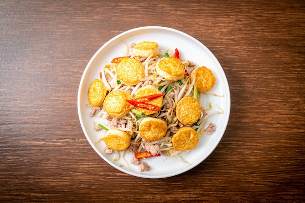 stir-fried bean sprout, egg tofu and minced pork - Asian food style