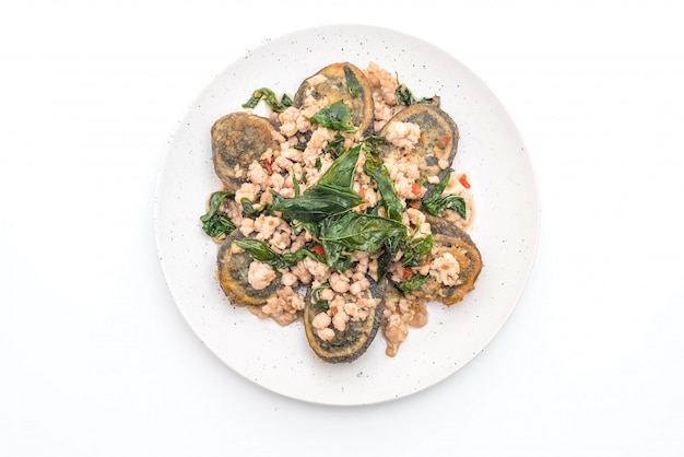 Stir-fried Century Egg and Minced Pork with Holy Basil Leaves