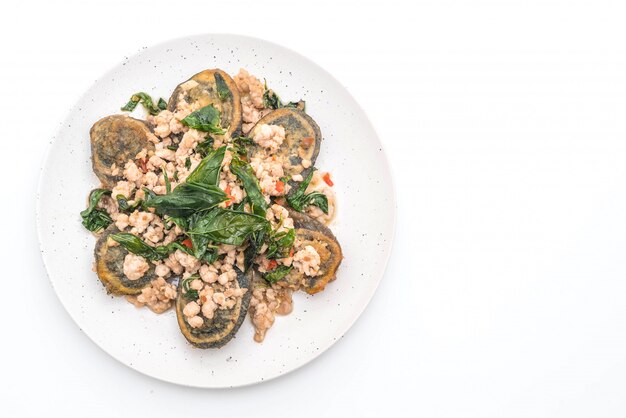 Stir-fried Century Egg and Minced Pork with Holy Basil Leaves