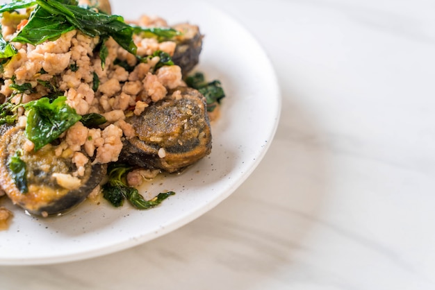 Stir-fried Century Egg and Minced Pork with Holy Basil Leaves