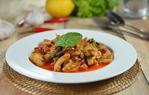 Stir fried chicken with holy basil and hot chilli