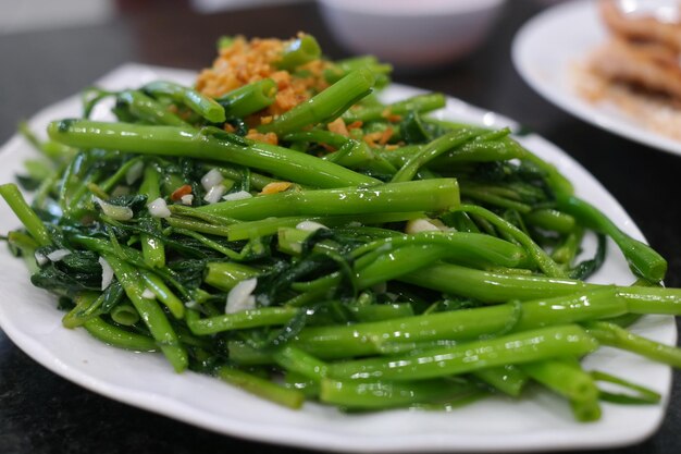 Photo stir fried chinese morning glory