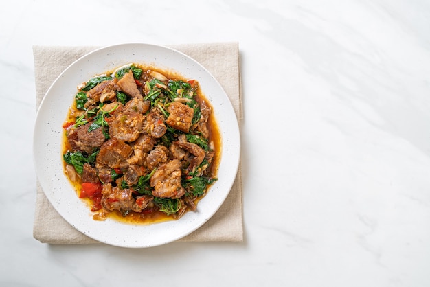 stir-fried crispy pork belly and basil