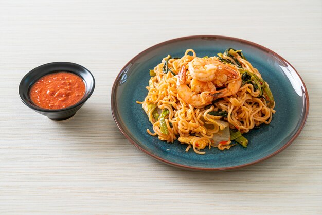 Stir-fried instant noodles sukiyaki with shrimps - Asian food style