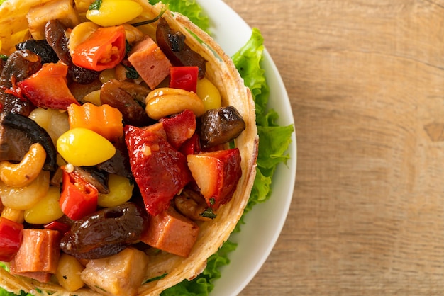 Stir fried mixed Chinese fruits 
and nuts - Asian food style