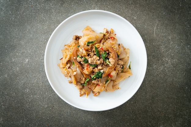 Stir-fried noodle with minced chicken and basil - Asian food style