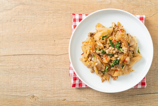 Stir-fried noodle with minced chicken and basil - Asian food style