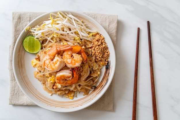 stir-fried noodles with shrimp and sprouts or Pad Thai - Asian food style