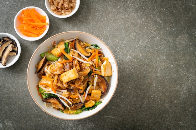 Stir-fried noodles with tofu and vegetables - vegan and vegetarian food style