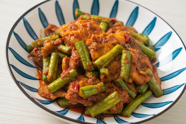 Stir fried pork with red curry paste - Thai food style