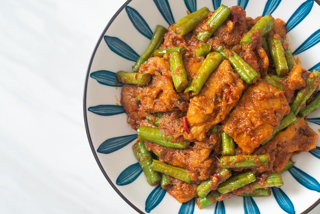 Stir fried pork with red curry paste