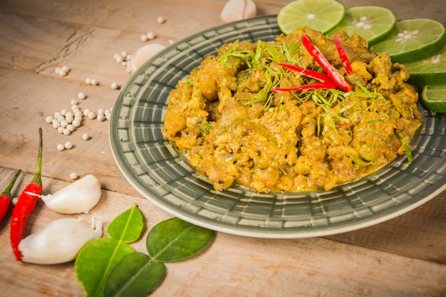 Stir Fried pork with yellow curry paste (khaw-kling). Thai food. 