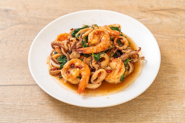 stir-fried seafood (shrimps and squid) with Thai basil - Asian food style