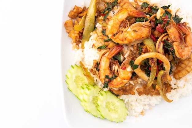 Stir Fried Seafood with Basil on Rice